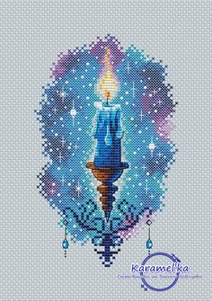 a cross stitch pattern with a candle in the center