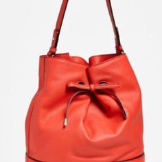 Looking Stylish Has Never Been Easier. Our New Kate Spade West Valley Valentine Bucket Bag Is Ruched In Soft Pebbled Leather With Our Signature Spade Link Accents For An Elegant Finish. Product Details 11.5"H X 8.5"W X 6"D Handle Drop: 6.5" Strap Drop: 22" Pebbled Leather With Pu Trim Microsuede Lining Plaque Logo Gold Hardware Snap Closure Bucket Bag With Drawstring Closure Interior Slip Pocket Optional Cross Body Strap New With Tag And Plastic Bag. Chic Orange Bucket Bag For Travel, Elegant Orange Shoulder Bag For Evening, Formal Kate Spade Pouch Shoulder Bag, Formal Orange Shoulder Bag With Detachable Strap, Formal Orange Bag With Detachable Strap, Elegant Orange Shoulder Bag For Formal Occasions, Kate Spade Formal Pouch Shoulder Bag, Evening Orange Shoulder Bag With Removable Pouch, Orange Shoulder Bag With Detachable Strap For Evening