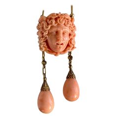 This is a Museum Quality Antique Etruscan Revival Victorian Carved Coral Necklace depicting Medusa with a Crown of Snakes with two pear shape coral drop pendants. The Coral Medusa is set in 14-18 Karat Gold with extraordinary Etruscan Revival beaded cannetille surmounts on the coral drops and a barrel clasp connecting the fine Etruscan gold chain. The necklace is a masterpiece of the period. The three dimensional head of Medusa is exquisitely carved. The face is spectacular with an open mouth an Etruscan Revival Jewelry, Medusa Artwork, Head Of Medusa, Medusa Snake, Snake Jewelry, Gothic Aesthetic, Necklace Antique, Coral Necklace, Coral Jewelry