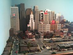 a model of a city with lots of tall buildings