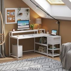 a computer desk in the corner of a room with a rug on the floor next to it