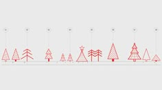 a line of christmas trees in red and white