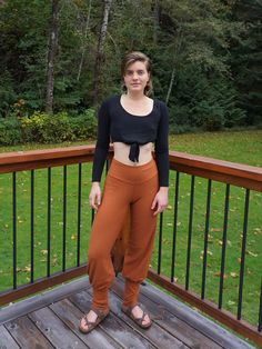 "Imagine leggings + straight leg merged into one pair of pants.   With their cozy high waist they are flattering, elegant and practical.   These warm bamboo fleece lined,  willow pants slip into boots, can be pulled up onto the calf and worn capri style, and look great with longer tunics & shorter shirts. The long cuff on the bottom is unique and funky, and allows the inseam to be flexible for 28\"-33\" inseam. Great for daily wear, yoga, dancing, hiking, gardening, and living life to it's fulle Loosely Fitted Harem Pants With Elastic Waistband For Fall, Fall Loungewear Wide Leg Harem Pants, Fall Season Solid Color Relaxed Fit Yoga Pants, Fall Harem Pants For Loungewear, Straight Leg, Fall Straight Leg Harem Pants For Loungewear, Fall Loungewear Yoga Trousers, Casual Full Length Yoga Pants For Fall, Solid Non-stretch Harem Pants For Fall, Casual Yoga Pants For Fall Season