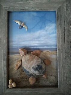 an animal is in a wooden frame with rocks and seagulls flying over it