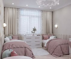 a bedroom with two beds and pink comforters