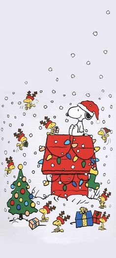 a snoopy christmas scene with presents in the snow