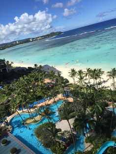 an aerial view of the beach and ocean from a hotel room at four seasons resort