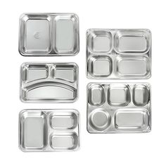 four silver trays with different compartments on them