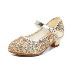 a pair of girls's gold glitter shoes