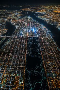 an aerial view of the city lights at night