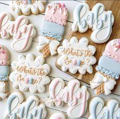 some decorated cookies are sitting on a table