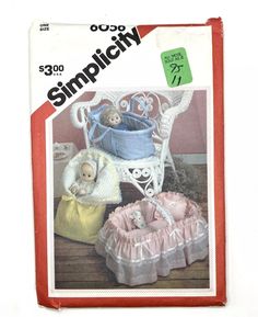 the sewing pattern for a baby's crib is shown in its packaging box