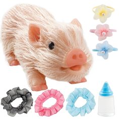 a pig toy with various hair accessories around it