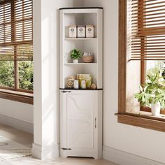 the corner cabinet is next to the window with blinds on it and plants in vases