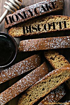 honey cake biscotti bread sliced and sitting on a wooden table next to a jar of chocolate butter