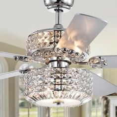 a chrome ceiling fan with crystal chandelier