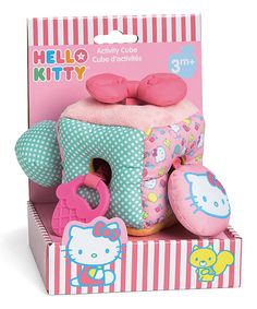 a hello kitty stuffed animal in a box