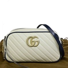 GUCCI GG Logo Marmont Small Quilting Chain Shoulder Bag Leather White Navy Blue GHW Italy   (GOOD CONDITION )   SKU ( KM1317 GA3  ) 👜DETAILS👜   BRAND GUCCI STYLE Shoulder Bag COLOR / MATERIAL White Navy Blue/Leather   COUNTRY OF MANUFACTURE  Italy SERIAL NUMBER 447632 520981 DIMENSION SIZE ( inch ) W  9.4 x H 5.5 x D 2.8   " (approx.) SIZE ( cm ) W  24 x H 14 x D 7  cm (approx.) HANDLE DROP ( inch /cm ) 0 "/ 0  cm (approx.) SHOULDER DROP ( inch /cm ) 22.4 - 23.6 "/ 57 - 60 cm(approx.) COME WITH ( Accessories)  Dust bag POCKETS OUTSIDE - INSIDE Open*1 ※ Example of Ranks ※ S New,Unused SA Less frequently used items A There is a little feeling of used, good condition AB There is a feeling of used, some noticeable scratches and dirt B There is a sense of overall used, there is a dirt and dam Gucci Style, Gucci Gg Marmont, Gg Logo, Gucci Models, Gucci Fashion, Gg Marmont, Handbag Wallet, Wallet Accessories, Chain Shoulder Bag