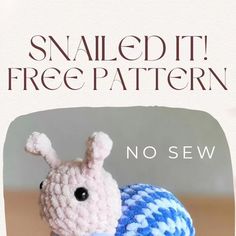 a small crocheted bunny sitting on top of a blue and white object with the words, nailed it free pattern no sew