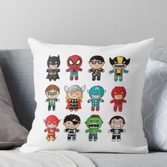 the avengerss throw pillow on a couch