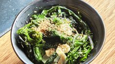 a close up of a bowl of food on a table