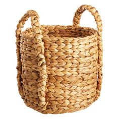 a large woven basket with handles on the inside is shown in front of a white background