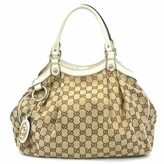 Used Gucci Handbag Gg Canvas Sukey Leather Beige Women's 211944 E58878a (Sku: Gzl13dv9) === General === Brand : Gucci === Design === Type : Handbag Material : Canvas , Leather Color : Beige Gender : Women === Size === Size (Hxwxd) : 26cm X 33cm X 7cm / 10.23'' X 12.99'' X 2.75'' === Included Items === Accessories : None Accessories Notice : Before Purchasing, Please Refer To The Images Of The Accessories Included With The Item. === Condition === Condition : Used (Good) Ranking : Rank Ab Used - T Cream Gucci Shoulder Bag For Daily Use, Gucci Cream Shoulder Bag For Daily Use, Gucci Cream Bag For Daily Use, Classic Beige Bag With Horsebit Detail, Classic Beige Bags With Horsebit Detail, Beige Shoulder Bag With Horsebit Detail For Everyday, Beige Shoulder Bag With Horsebit Detail, Daily Use Gucci Cream Shoulder Bag, Luxury Bags With Horsebit Detail