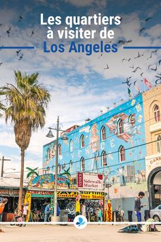 an advertisement for the los angeles fairground with birds flying over it and people walking around