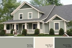 a blue house with white trim and windows