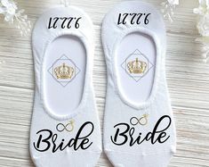 two pairs of shoes that say bride's maid and the other pair has a crown on them