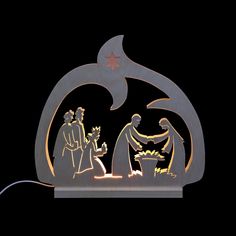 an illuminated nativity scene with the birth of jesus