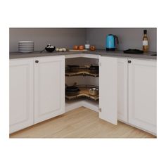 an open cabinet in a kitchen with white cupboards