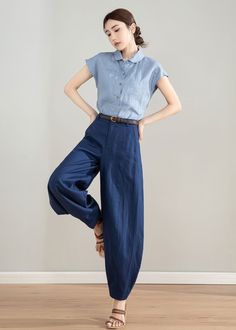 "Introducing our stylish Blue Linen Tapered Wide-Leg Pants - the perfect addition to your summer wardrobe! These pants feature a tapered leg design that creates a sleek and modern silhouette, while the premium quality linen fabric feels soft and breathable against your skin. The versatile blue color makes these pants easy to pair with any outfit. With their comfortable fit and timeless style. Order now and experience the perfect blend of style and comfort! DETAIL * 100% linen * Two side pockets * Front button and zipper closure * Wide leg pants * Tapered pants * High waisted Pants * Has belt loops to keep everything in place  * Perfect for summer, autumn and spring * Wash by hand or machine with cold water * The belt model wears is not for sale Mode size Waist 26\"(66cm) Heigth 5'7\"(167cm Baggy Linen Pants Outfit, Long Pants Summer Outfit, Wide Leg Crop Pants Outfit, Elegant Pants Outfit, Blue Linen Pants Outfit, Baggy Linen Pants, High Waisted Linen Pants, Spring Pants, Blue Linen Pants