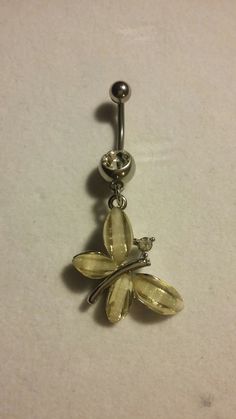 an image of a flower belly button ring