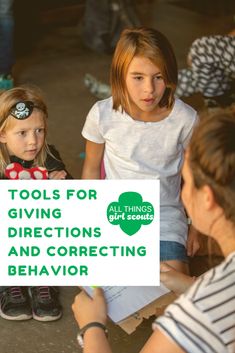 two girls and one girl are holding a sign that says tools for giving directions and correcting behavior