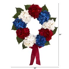 a wreath with red, white and blue flowers