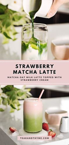 strawberry matcha latte is being poured into a glass with strawberries on the side