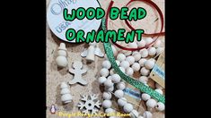 an assortment of wood bead ornament beads and other crafting supplies on a table