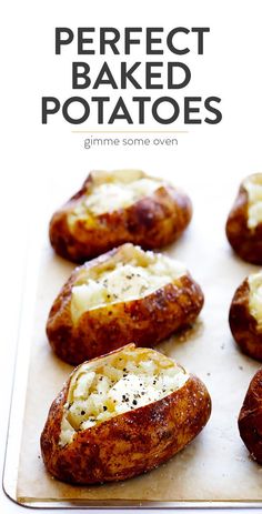 baked potatoes on a baking sheet with cheese