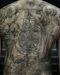 the back of a man's body with tattoos on it, including an angel and clock