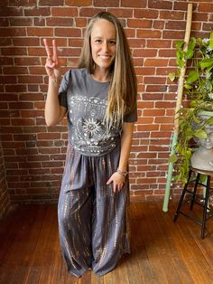 Add a pop of color and boho vibes to your wardrobe with our these Tie Dye Wide Leg Palazzo Pants. These flowy tiered pants can be dressed up or down for any occasion. Don't be afraid to get creative with your style! Free Size, will fit sizes up to an XL best Waist 24-36", Inseam 26", Front/Back Rise 16", Length 42" Hips: up to 50" Rayon Fair Trade made in Nepal Handwash or machine wash delicate Air Dry/Tumble Dry Low Please take a moment to look over all shop policies before purchasing. Wide Leg Palazzo Pants, Palazzo Pants, Boho Vibe, Free Size, Wide Leg Pants, Wide Leg, Tie Dye, Color Pop, Dye