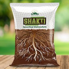 a bag of shakti is sitting on a wooden table in front of some trees