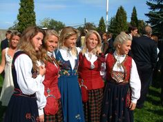 a group of young women standing next to each other