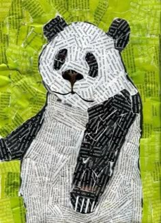 a panda bear made out of newspaper strips and torn into pieces, with the words on it