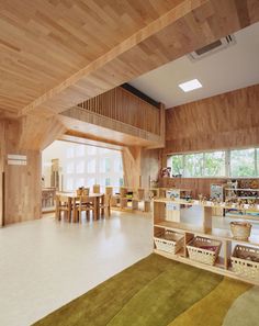 a large room with wooden walls and flooring