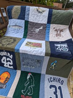 a blanket that has various patches on it, and the number 31 is printed on it