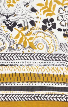 an abstract yellow and black pattern on fabric