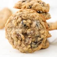 three oatmeal cookies stacked on top of each other with one cookie in the middle