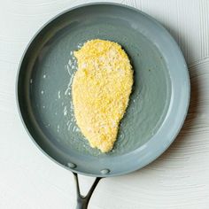 a yellow substance is in a frying pan