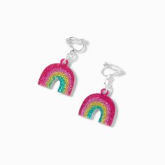 Make a statement while wearing this pair of earrings! The dainty drops feature a glitter rainbow charm hanging from each earring. Plus, they're clip-ons, so you don't need to have your ears pierced to wear them! Finish: Silver-toneDrop: 1 in. / 2.54 cm.Closure: Clip onMaterial: Acrylic - Claire's Glitter Rainbow 1'' Clip-On Drop Earrings Multicolor Glitter Dangle Earrings, Dance Shirts Ideas, Claires Earrings, Rainbow Nail Art, Rainbow Nail, Ears Pierced, Piercing Kit, Glitter Rainbow, Kawaii Earrings